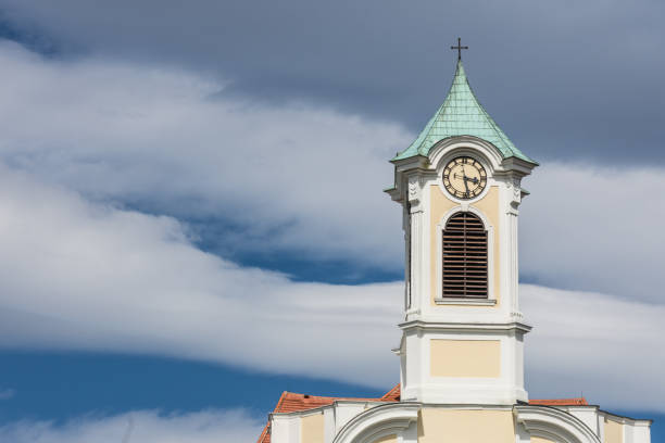 istock nice old tower with a clock from a church with sky 1412799433