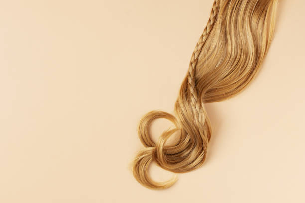 istock Long golden blond curly hair. 1412800316