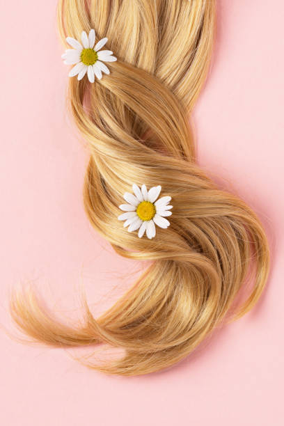 Long golden blond curly hair.