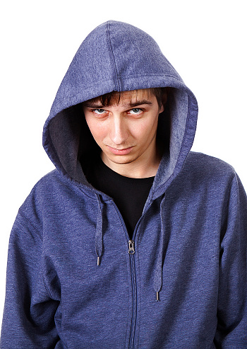 Sullen Guy Portrait in a Hoodie Isolated on the White Background