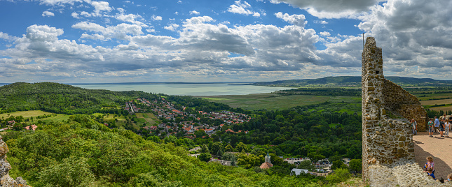 Szigliget, Hungary - July 2022: Panoramic view from the castle at Szigliget (hungarian: Szigligeti vár) over the nearby village and Lake Balaton.
