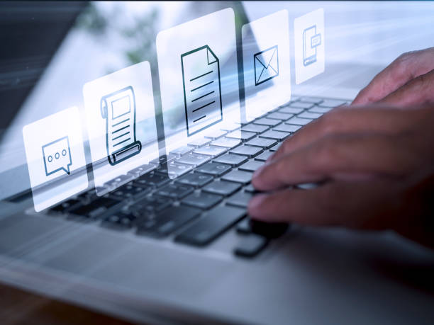 istock Hands man useing laptop computer with E-commerce technology icons on virtual screen. Business global, social media marketing concept. 1412806794