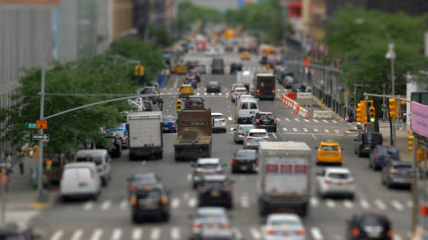Telephoto shot of a New York road with lots of traffic blurred to give a toy or miniature effect.