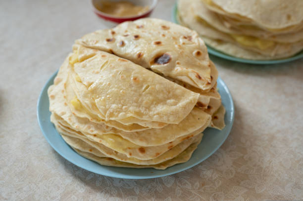 istock Qistibi - popular traditional dish in Tatarstan, Bashkortostan and Chuvashia. Roasted flatbreads with mashed potato 1412815762