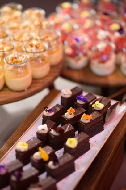 istock Brownies and other baked puddings on display ready to be served 1412815989