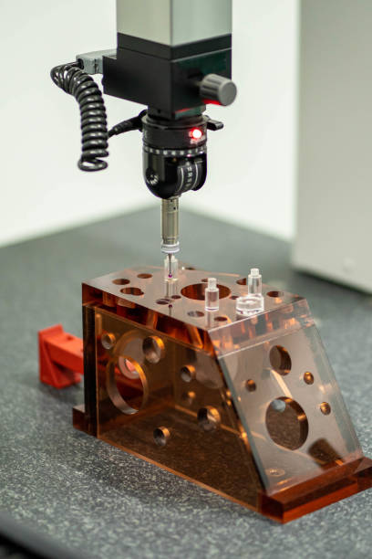 istock Close up automatic coordinate measurement machine (CMM) for inspection of high precision part during working 1412817096