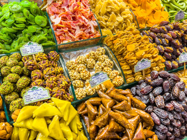 istock Price labeled dried nuts and fruits, high angle 1412817131