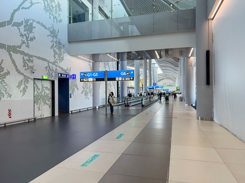 Istanbul, Turkey, 01/28/2022; A modern corridor in new Istanbul airport. People walking.