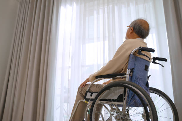 istock Senior man is sitting on wheelchair. 1412819860