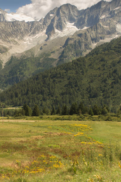 istock italian mountains with clouds and glacier 1412822163
