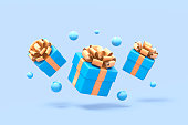 Blue gift boxes with golden ribbon