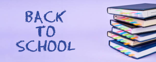 istock A stack of notepads with colorful sticky page markers as a back to school concept 1412823826