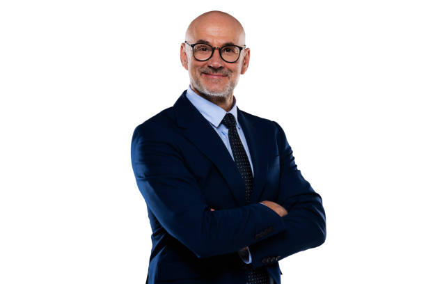 istock Middle aged businessman wearing suit and tie while standing at isolated background 1412823877