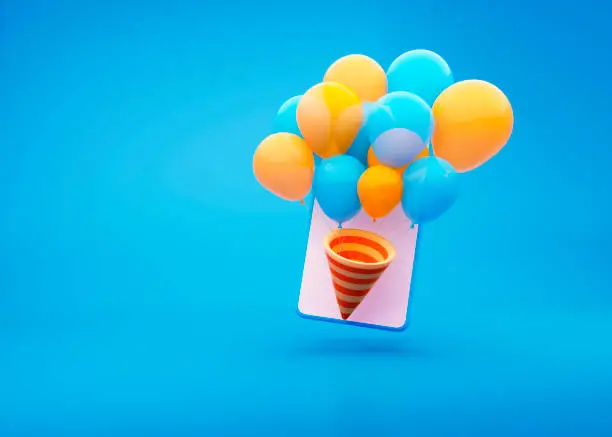 Photo of Phone with balloons of blue and yellow colors inserted into the popper flying out of the screen. For celebrate a birthday online. 3d rendering illustration a blue background.