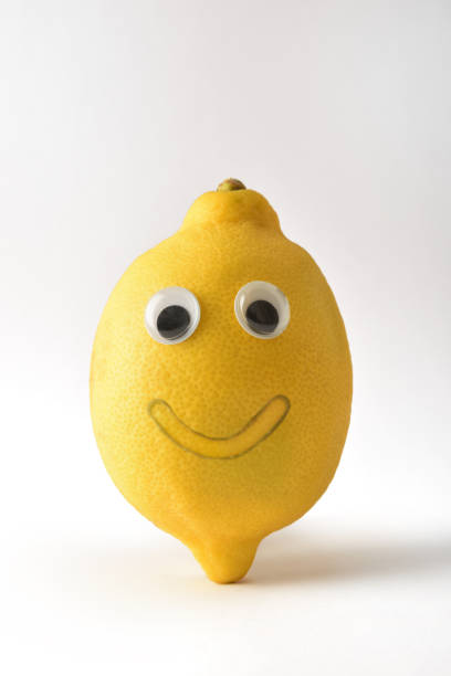 istock Funny lemon with face on white isolated background 1412834993