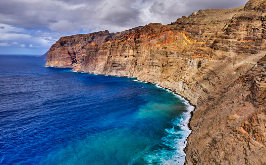 A Tenerife coastline with rock formation, wide angle view of the sea.
