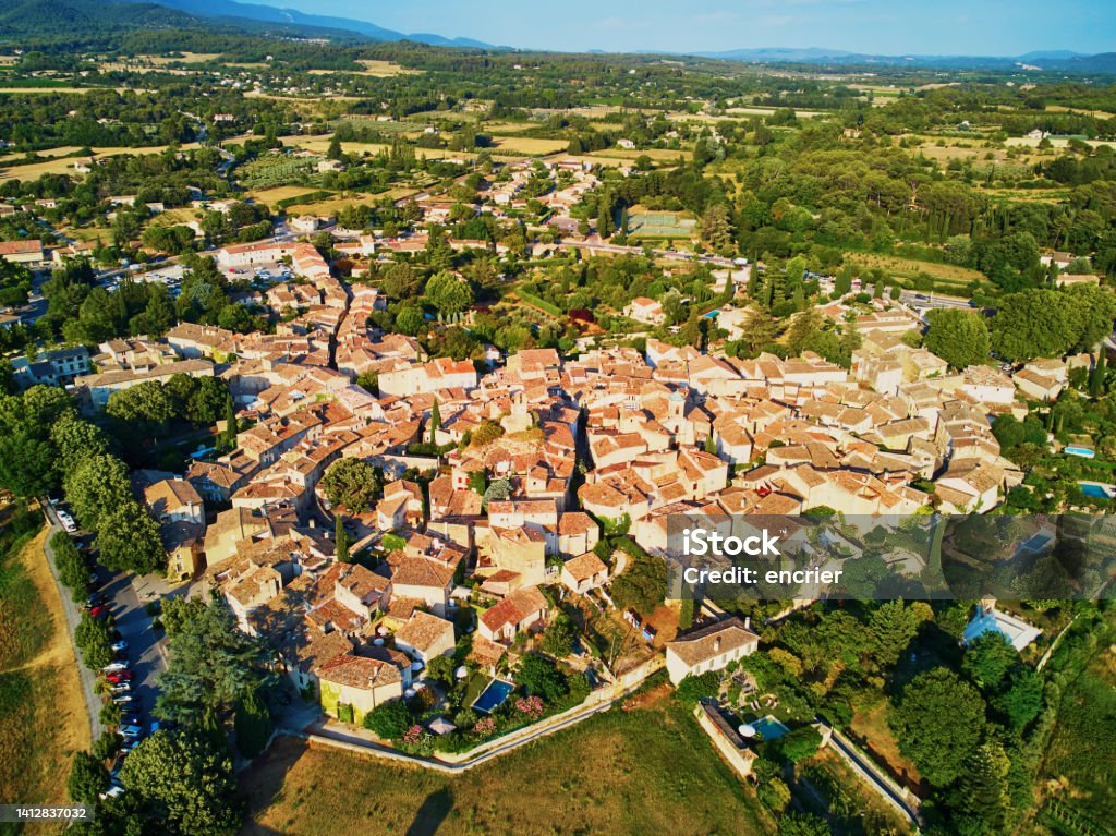 Aerial view to famous village of Lourmarin in Provence, Southern France Aerial drone view to famous village of Lourmarin in Provence, Southern France France Stock Photo