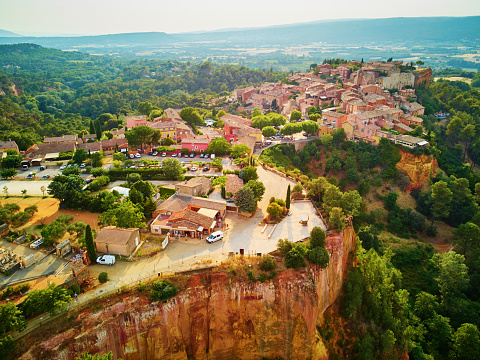 Aerial scenic view of Roussillon, Provence, France. Roussillon is known for its large ochre deposits found in the clay surrounding the village