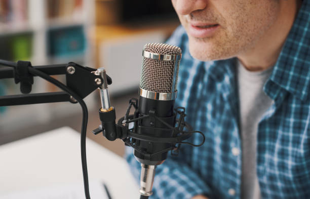istock Professional speaker recording a live podcast 1412837554