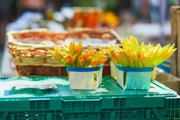 Squash flowers on market in Cucuron, Provence, France stock photo