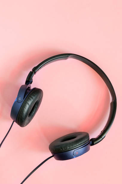 istock Headphones on pink 1412838943