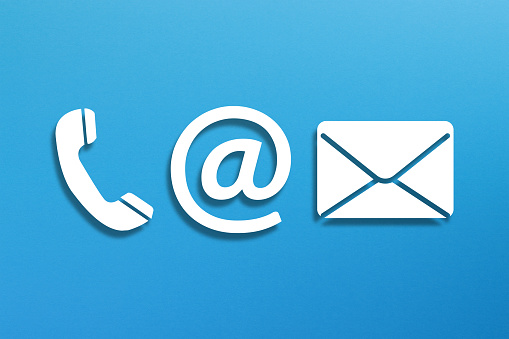 Contact us symbols on blue background. E-mail, telephone, message icons.