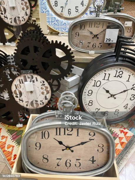 A Display With A Group Of Vintage Watches Concept Of Time Passing By Antique Watches Imitation Wall Clock Stock Photo - Download Image Now