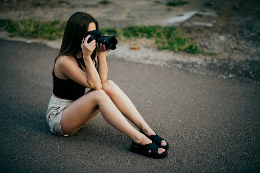 Women Photographer on the street in summer