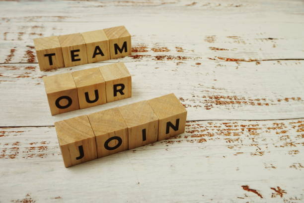 istock Join Our Team Word alphabet letters on wooden background 1412842420