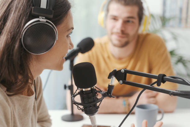 istock Young speakers doing a live podcast 1412843139