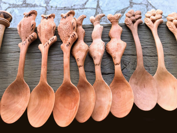 Wooden kitchen unique utensils stacked view close up isolated