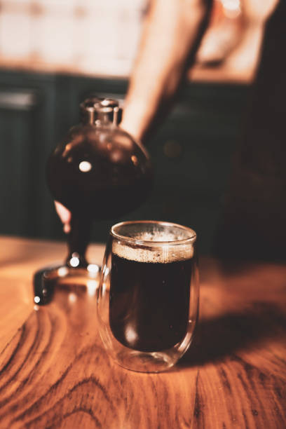 istock barista brewing coffee in the coffee room 1412846557