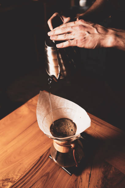 istock barista brewing coffee in the coffee room 1412846616