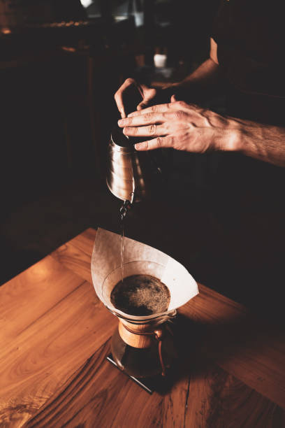 istock barista brewing coffee in the coffee room 1412846641