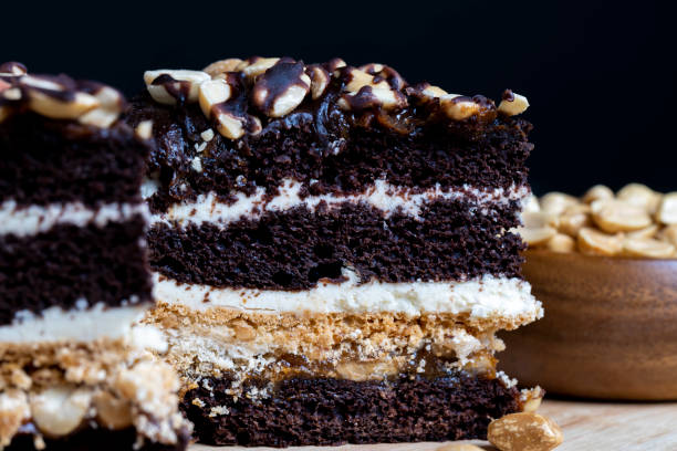 istock chocolate cake with nut filling and peanuts 1412847741