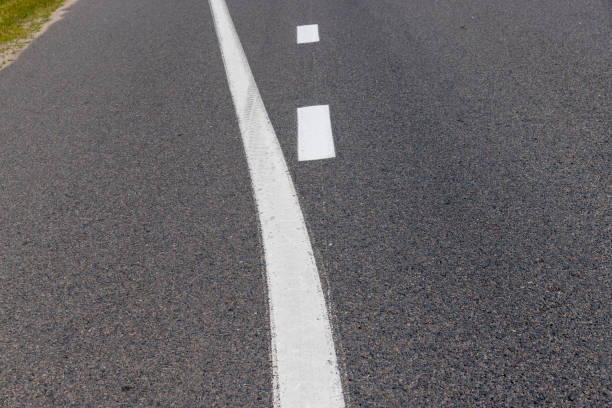 istock paved road for car traffic 1412847812
