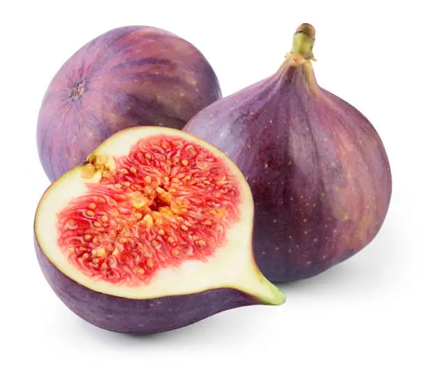 Photo of Fresh fig isolated. Figs with slice on white background. Fig - whole and a half. With clipping path.