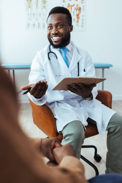 istock Describing all his symptoms down to the detail 1412851954