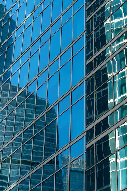 Architecture abstract background, close-up shot of office building windows