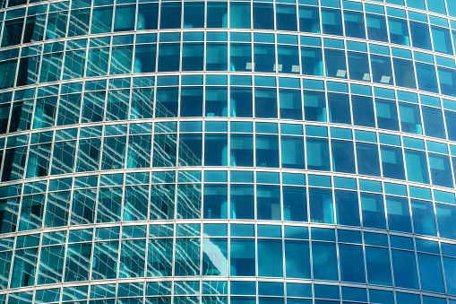 Architecture abstract background, close-up shot of office building windows