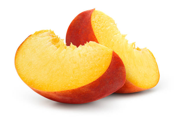 istock Peach slice isolated. Peach slices on white background. Peaches with clipping path. 1412852312