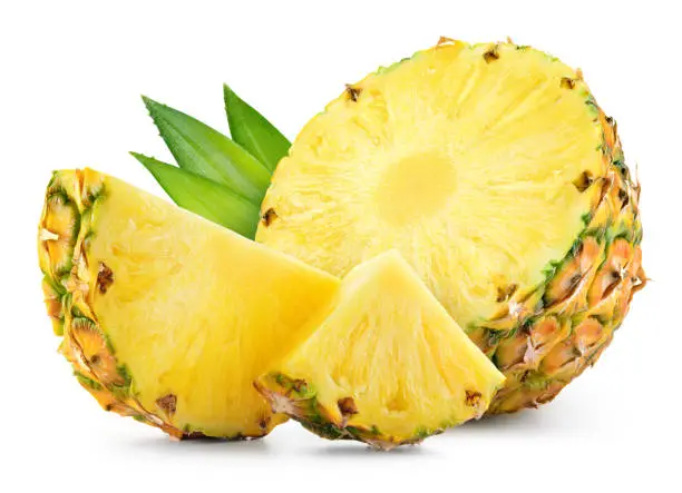 Photo of Pineapple with leaves and slices isolated. Cut pineapple with pieces on white background. Full depth of field.