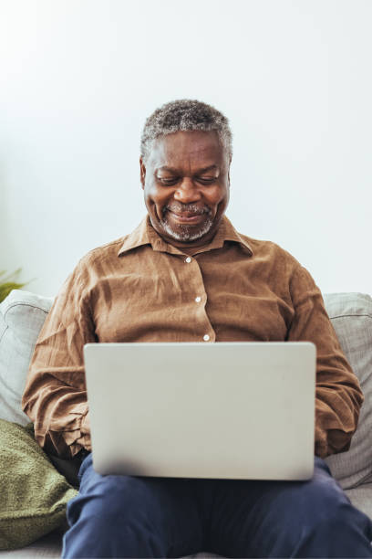 istock Senior man paying bills or doing home finances 1412852822