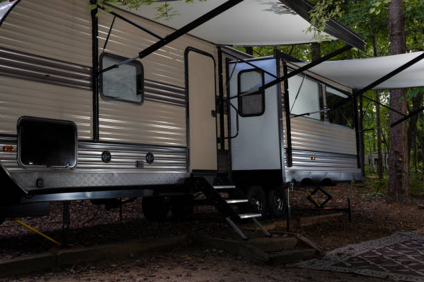 istock Camping trailer with awnings extended 1412853469