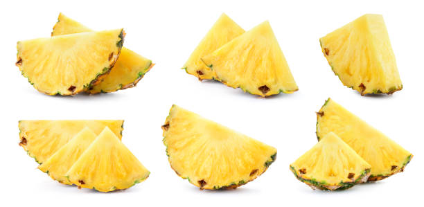 istock Pineapple slice isolated. Pineapple slices collection on white background. Fresh pineapples set. Full depth of field. 1412853735