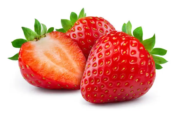 Photo of Strawberries isolated. Strawberry whole and a half on white background. Strawberry slice. With clipping path. Full depth of field.