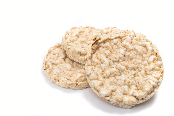 istock Exquisite round rice crackers on a white surface. Copy Space. Healthy eating. 1412857636