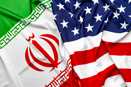 United States of America flag and Iran flag together top view