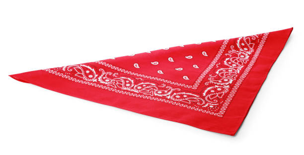 Folded red bandana with paisley pattern isolated on white
