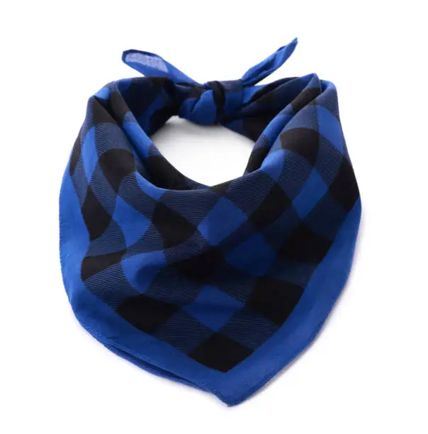 Tied blue bandana with check pattern isolated on white